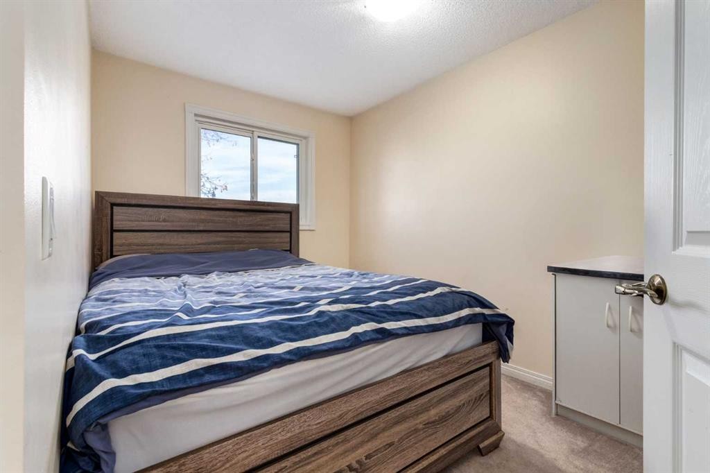 150 Martinbrook Road Ne, Calgary, AB - Indoor Photo Showing Bedroom
