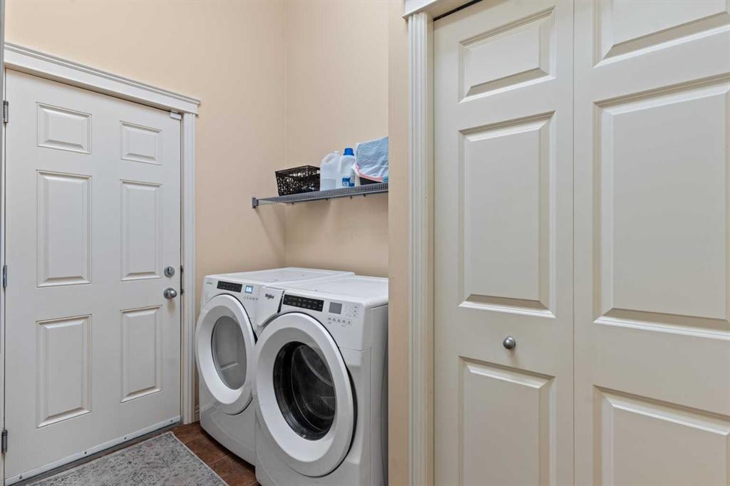 137 Copperleaf Bay Se, Calgary, AB - Indoor Photo Showing Laundry Room