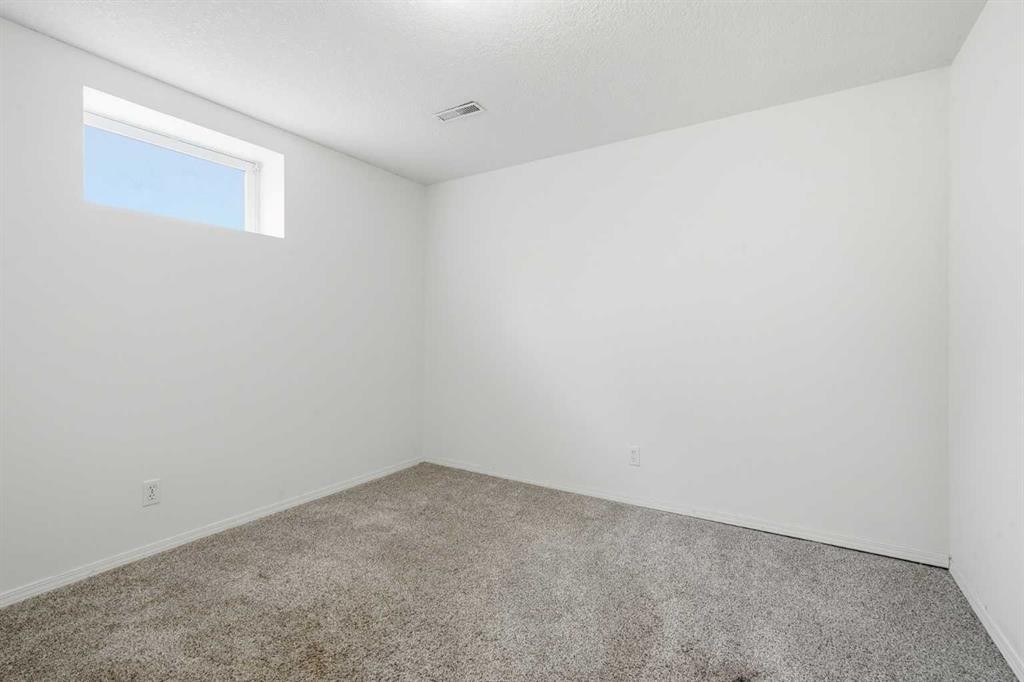 66 Eldridge Rise Se, Airdrie, AB - Indoor Photo Showing Other Room