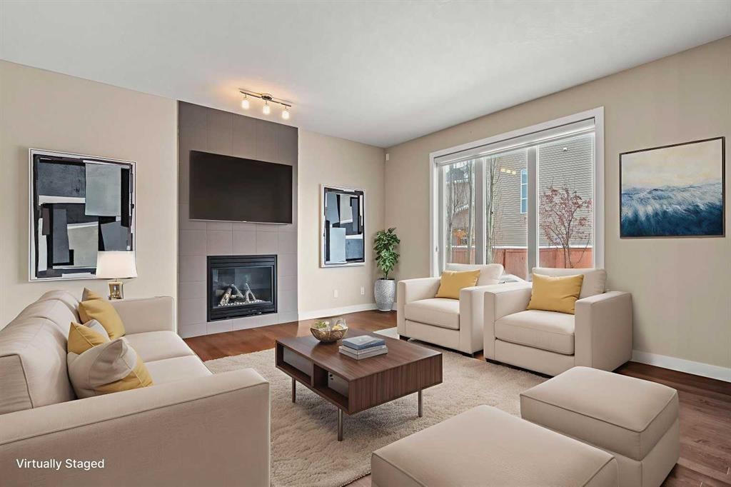2306 Bayside Circle Sw, Airdrie, AB - Indoor Photo Showing Living Room With Fireplace