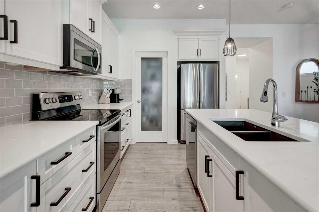 236 Auburn Glen Close Se, Calgary, AB - Indoor Photo Showing Kitchen With Double Sink With Upgraded Kitchen