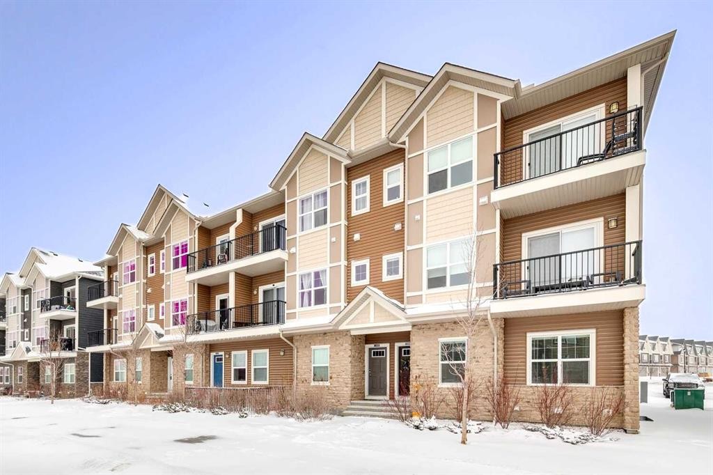 1009-250 Fireside View, Cochrane, AB - Outdoor With Balcony With Facade