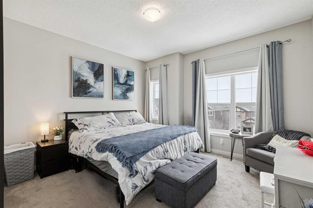 1009-250 Fireside View, Cochrane, AB - Indoor Photo Showing Bedroom