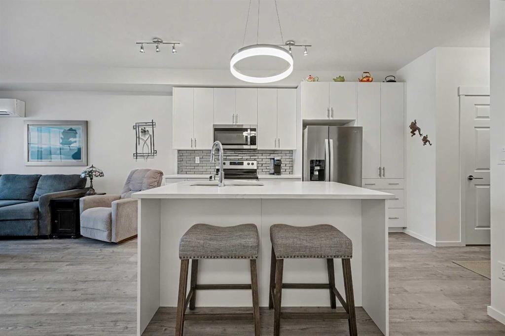 5105-151 Legacy Main Street Se, Calgary, AB - Indoor Photo Showing Kitchen With Stainless Steel Kitchen With Upgraded Kitchen