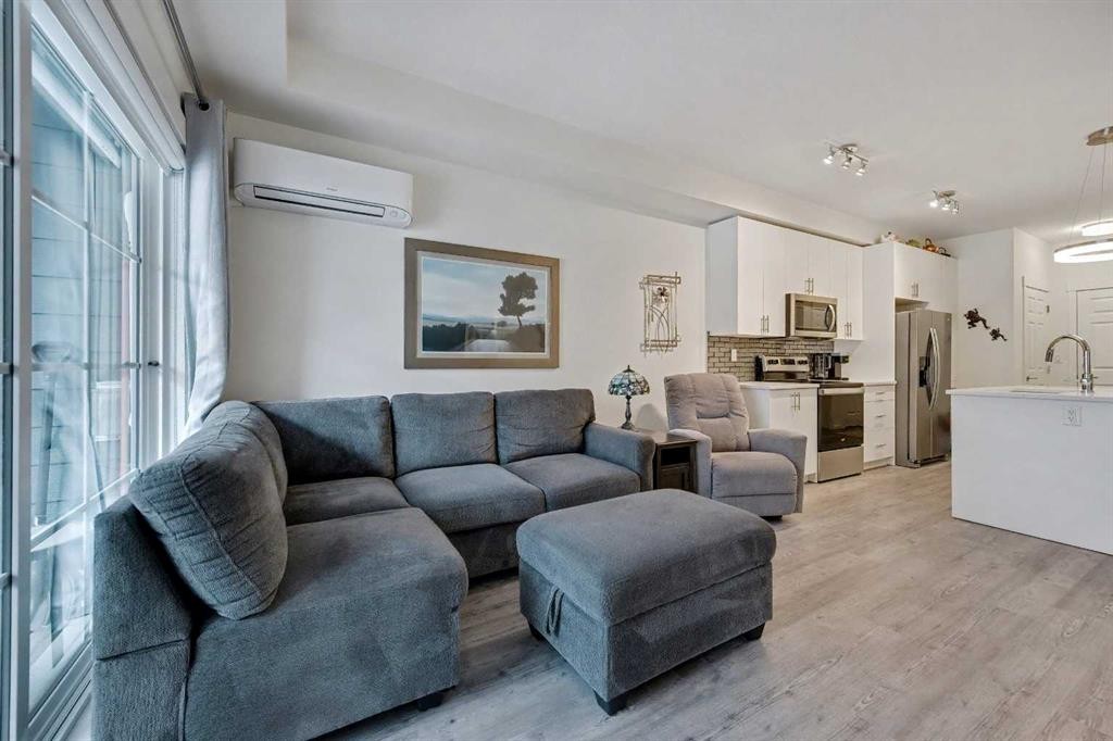 5105-151 Legacy Main Street Se, Calgary, AB - Indoor Photo Showing Living Room