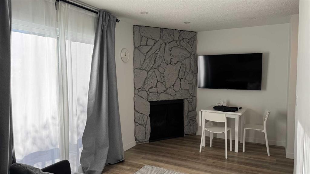 2820 16 Avenue Se, Calgary, AB - Indoor With Fireplace