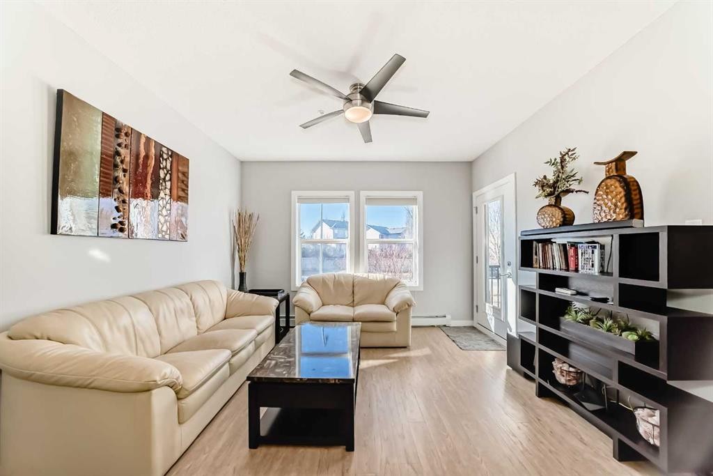 107-100 Cranfield Common Se, Calgary, AB - Indoor Photo Showing Living Room