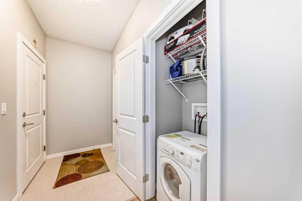 107-100 Cranfield Common Se, Calgary, AB - Indoor Photo Showing Laundry Room