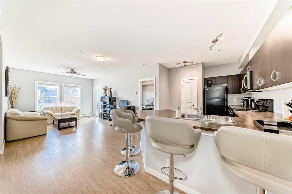 107-100 Cranfield Common Se, Calgary, AB - Indoor Photo Showing Living Room