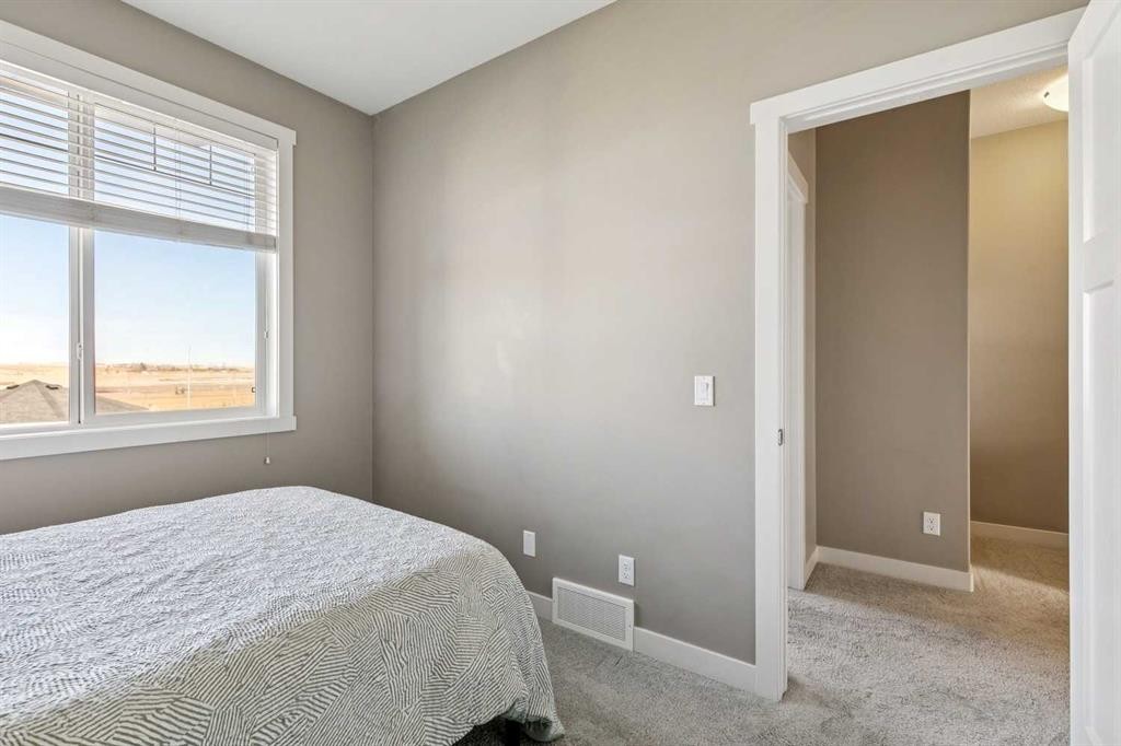 605 Evanston Manor Nw, Calgary, AB - Indoor Photo Showing Bedroom