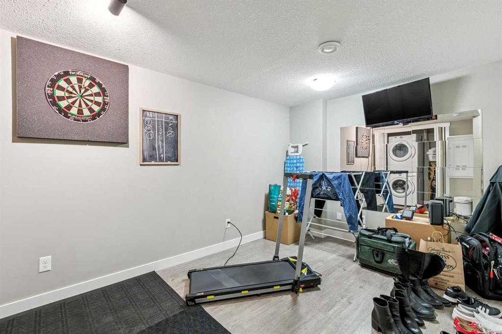 605 Evanston Manor Nw, Calgary, AB - Indoor Photo Showing Gym Room