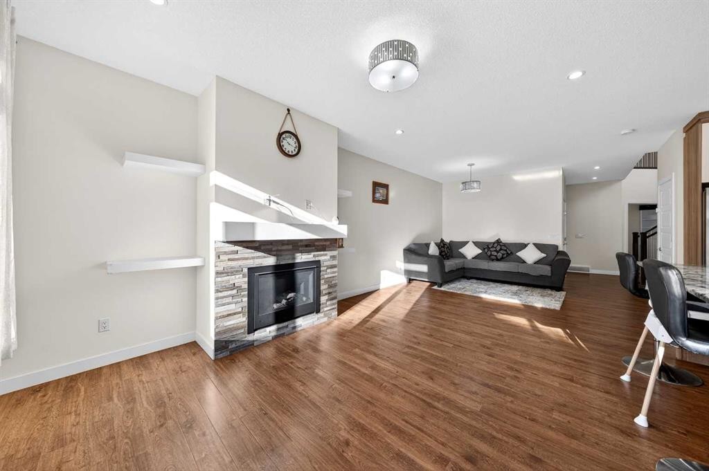 353 Nolanhurst Crescent Nw, Calgary, AB - Indoor Photo Showing Living Room With Fireplace
