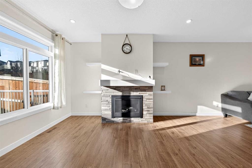 353 Nolanhurst Crescent Nw, Calgary, AB - Indoor Photo Showing Living Room With Fireplace