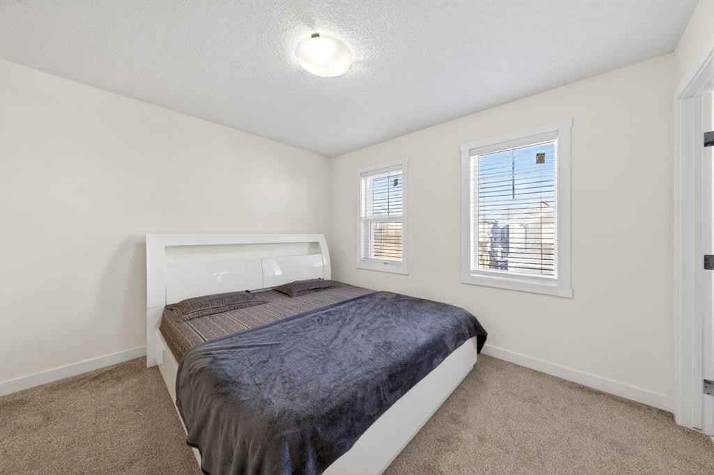 353 Nolanhurst Crescent Nw, Calgary, AB - Indoor Photo Showing Bedroom