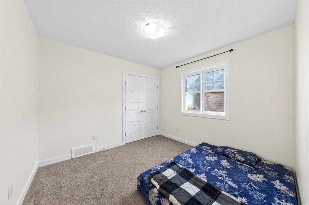 353 Nolanhurst Crescent Nw, Calgary, AB - Indoor Photo Showing Bedroom