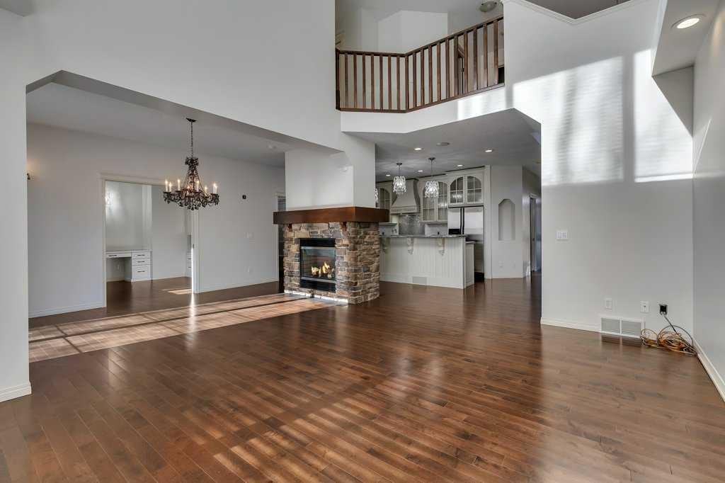 218 Valley Woods Place Nw, Calgary, AB - Indoor With Fireplace