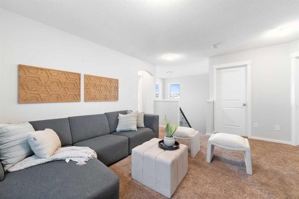 295 Prairie Springs Crescent Sw, Airdrie, AB - Indoor Photo Showing Living Room