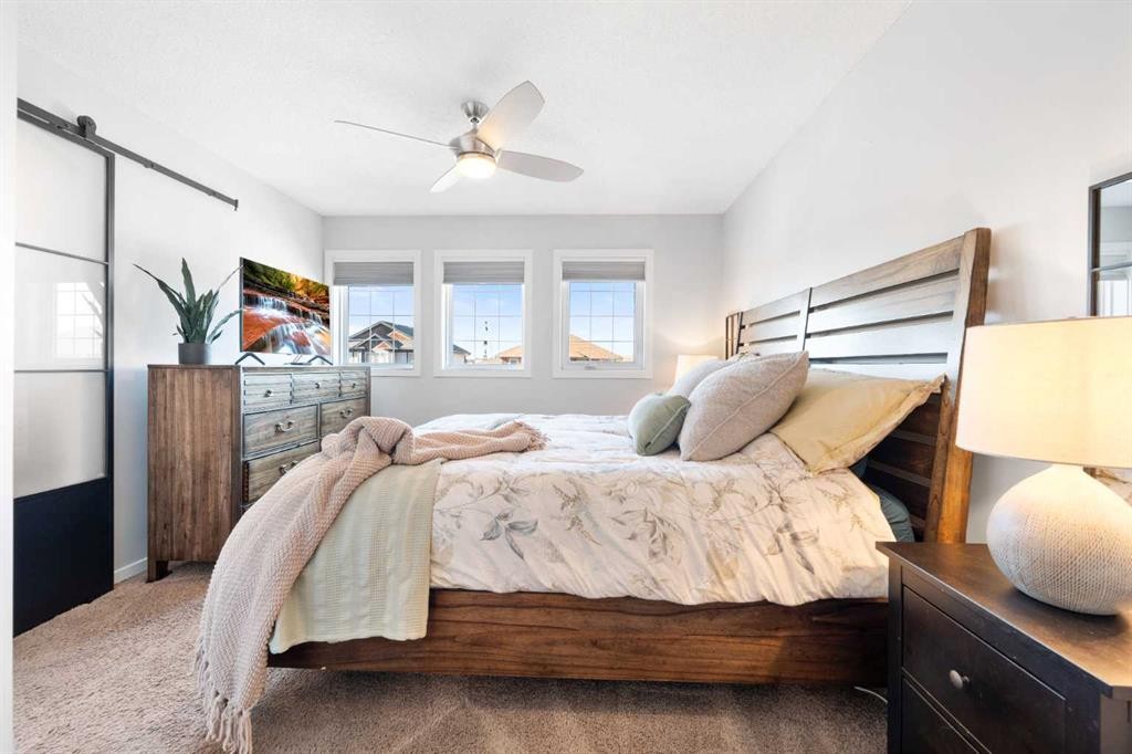 295 Prairie Springs Crescent Sw, Airdrie, AB - Indoor Photo Showing Bedroom