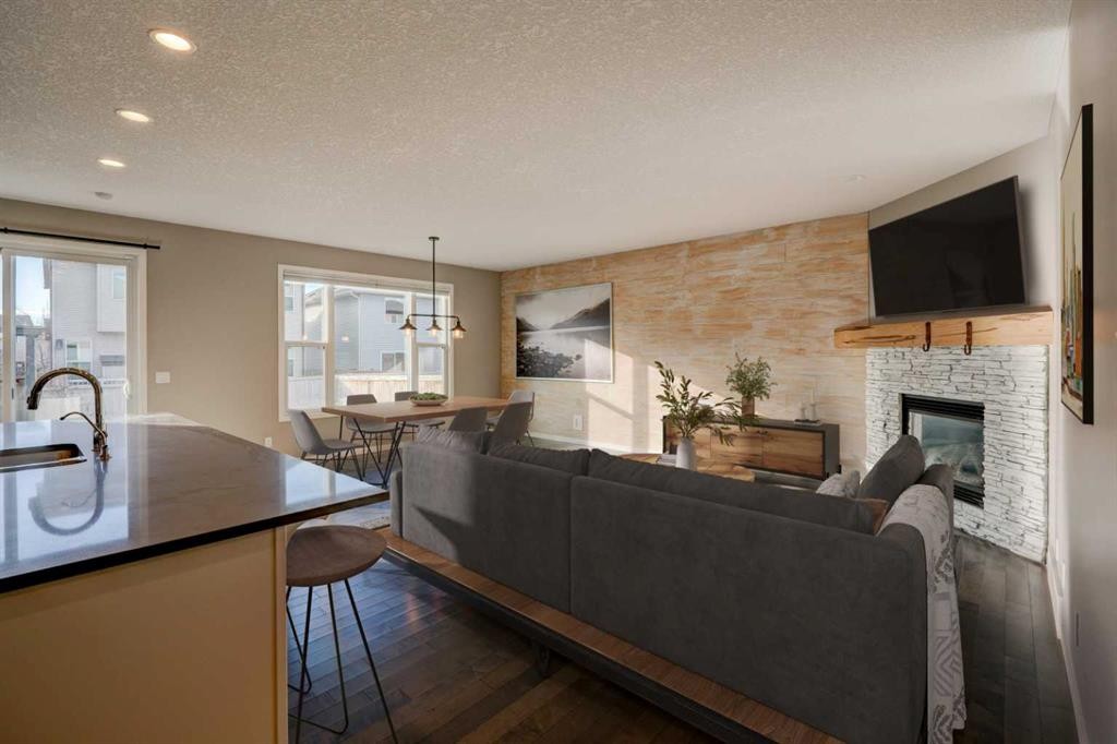 2016 Brightoncrest Green Se, Calgary, AB - Indoor Photo Showing Living Room With Fireplace