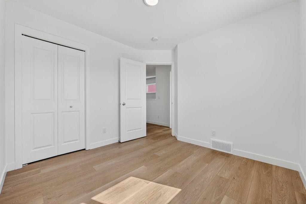 83 Legacy Passage Se, Calgary, AB - Indoor Photo Showing Other Room