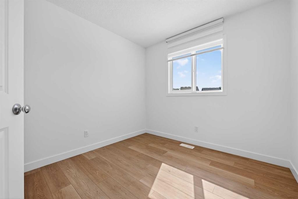 83 Legacy Passage Se, Calgary, AB - Indoor Photo Showing Other Room