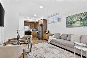 83 Legacy Passage Se, Calgary, AB - Indoor Photo Showing Living Room