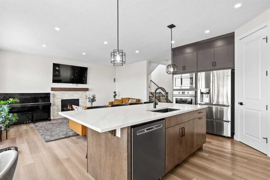 68 Walcrest View Se, Calgary, AB - Indoor Photo Showing Kitchen With Fireplace With Upgraded Kitchen