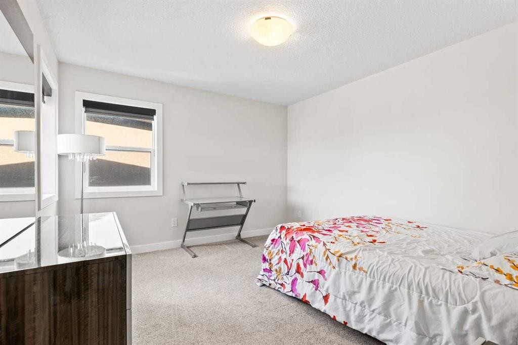 68 Walcrest View Se, Calgary, AB - Indoor Photo Showing Bedroom