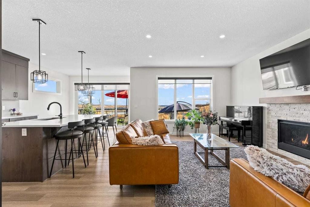 68 Walcrest View Se, Calgary, AB - Indoor Photo Showing Living Room With Fireplace