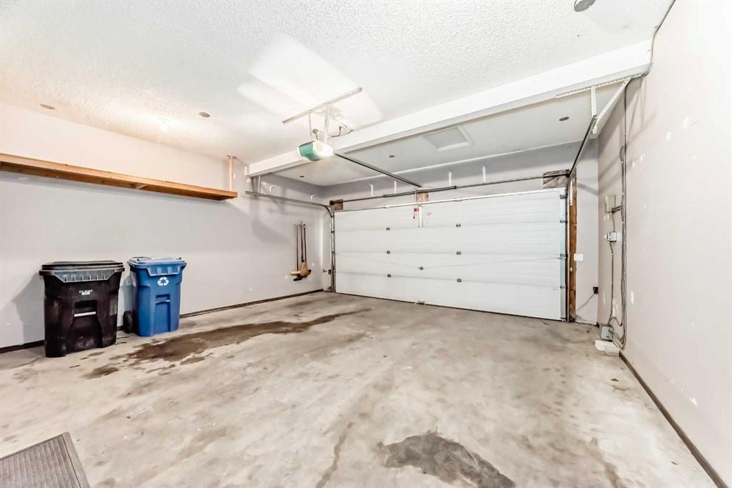 12774 Coventry Hills Way Ne, Calgary, AB - Indoor Photo Showing Garage