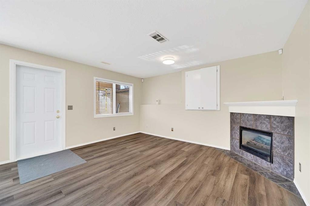 30 Tuscarora Way Nw, Calgary, AB - Indoor With Fireplace