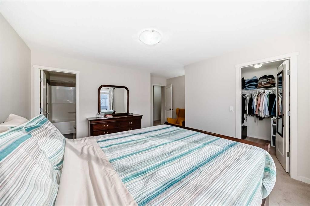 48 Copperpond Landing Se, Calgary, AB - Indoor Photo Showing Bedroom