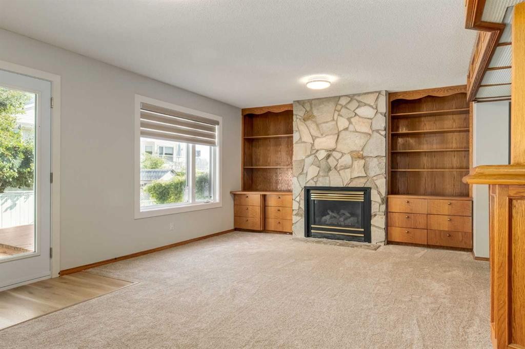 44 Citadel Manor Nw, Calgary, AB - Indoor Photo Showing Living Room With Fireplace