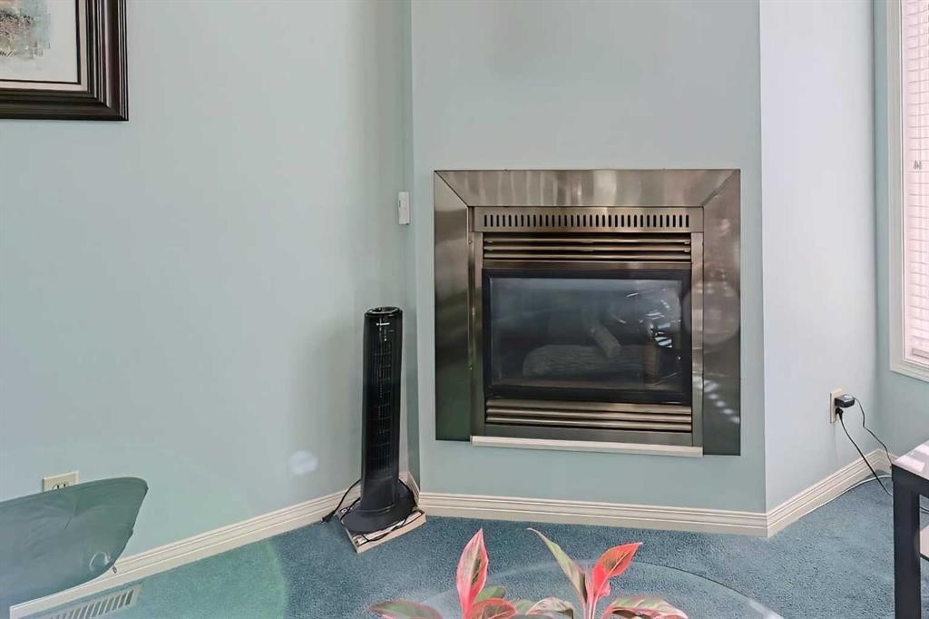317 Sandringham Road Nw, Calgary, AB - Indoor With Fireplace