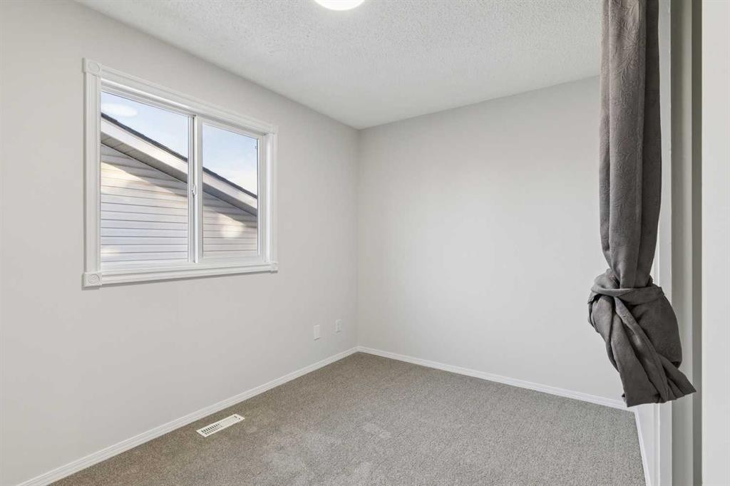 354 Maitland Hill Ne, Calgary, AB - Indoor Photo Showing Other Room