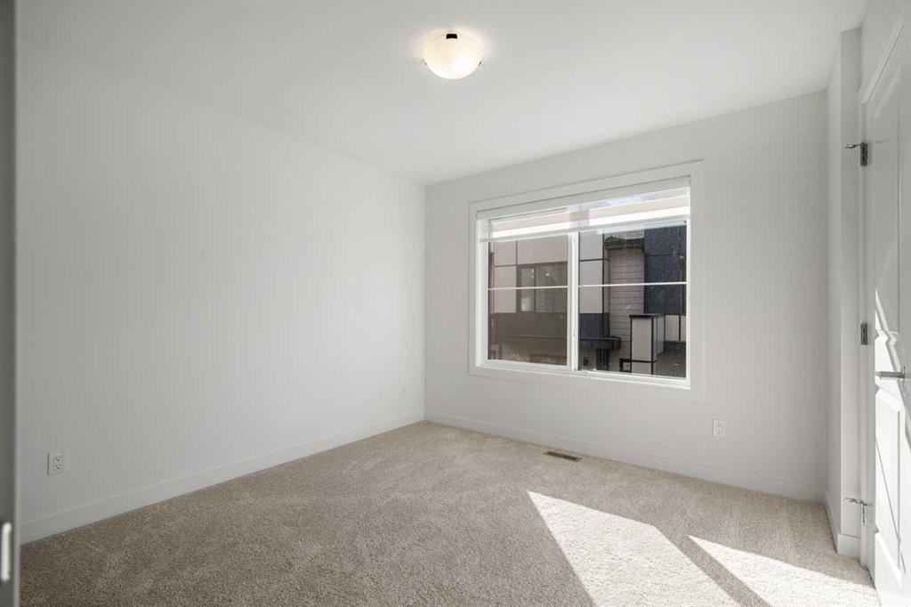 204-550 Seton Circle Se, Calgary, AB - Indoor Photo Showing Other Room