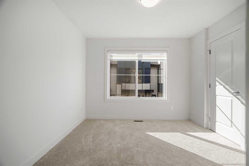 204-550 Seton Circle Se, Calgary, AB - Indoor Photo Showing Other Room