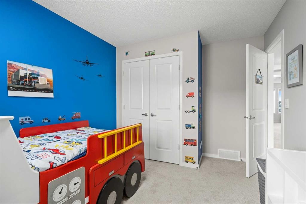 71 Nolanfield Crescent Nw, Calgary, AB - Indoor Photo Showing Bedroom
