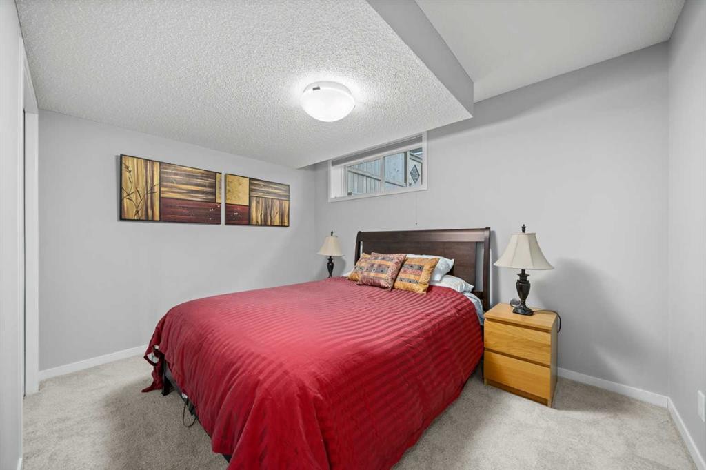 71 Nolanfield Crescent Nw, Calgary, AB - Indoor Photo Showing Bedroom