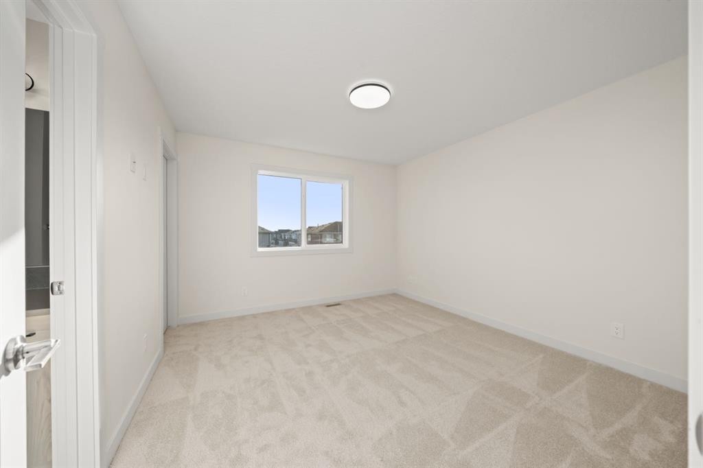 25 Sora Gate Se, Calgary, AB - Indoor Photo Showing Other Room