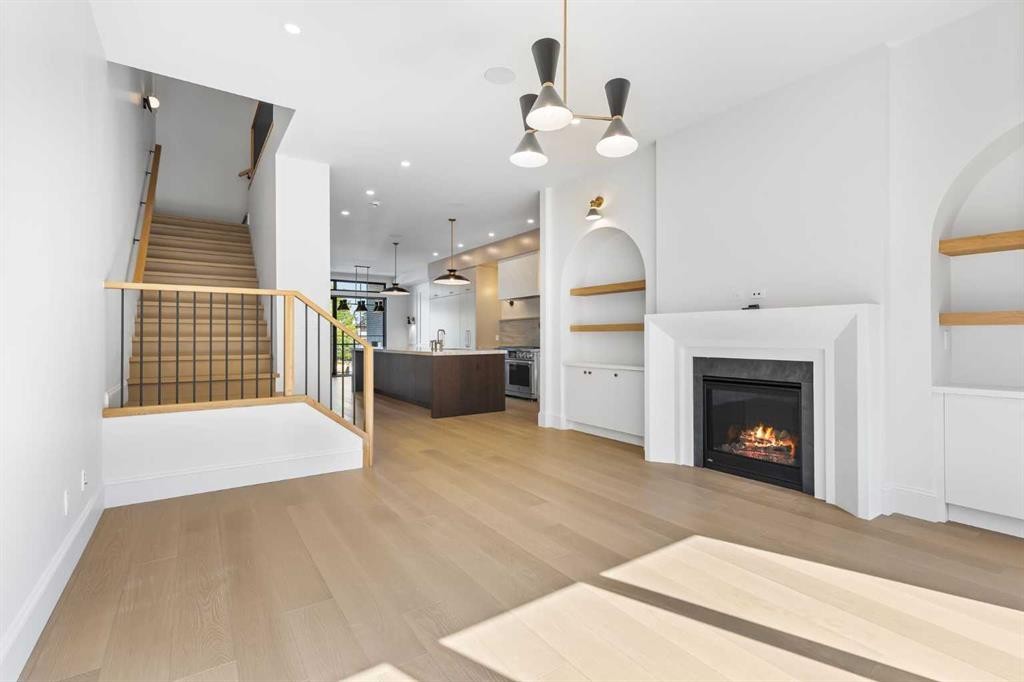 2011 28 Avenue Sw, Calgary, AB - Indoor Photo Showing Living Room With Fireplace