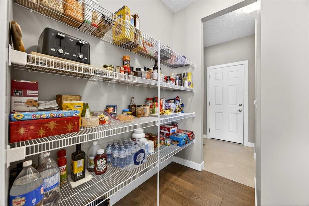 144 Sundown View, Cochrane, AB - Indoor With Storage