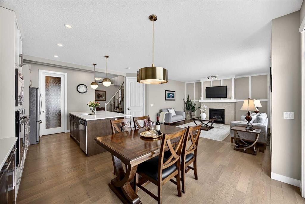144 Sundown View, Cochrane, AB - Indoor With Fireplace