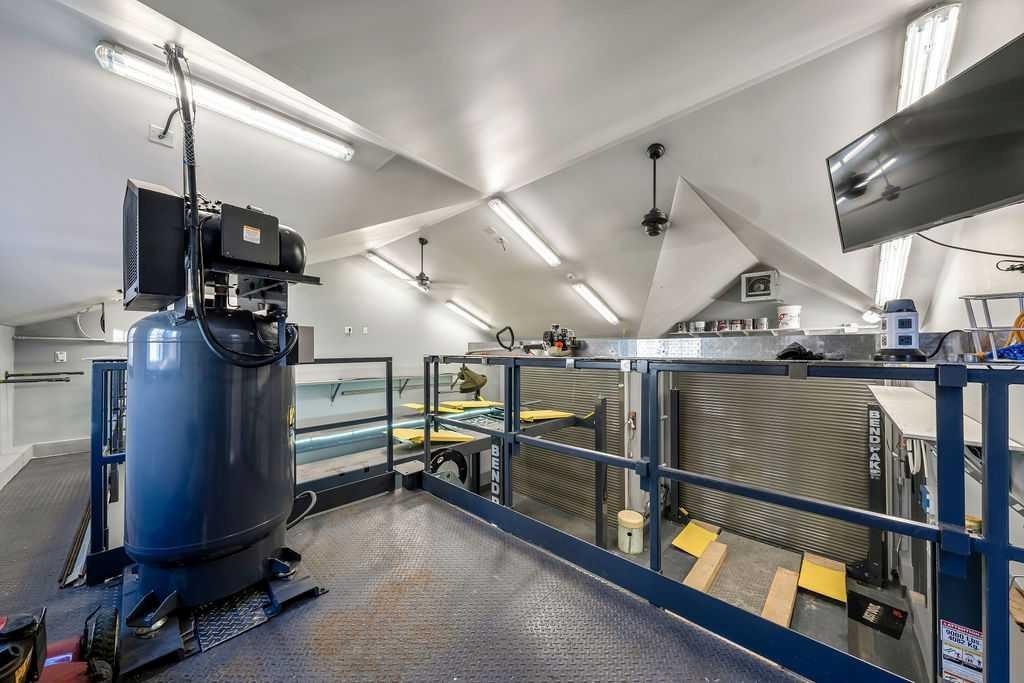 14 Tuscany Springs Rise Nw, Calgary, AB - Indoor Photo Showing Garage