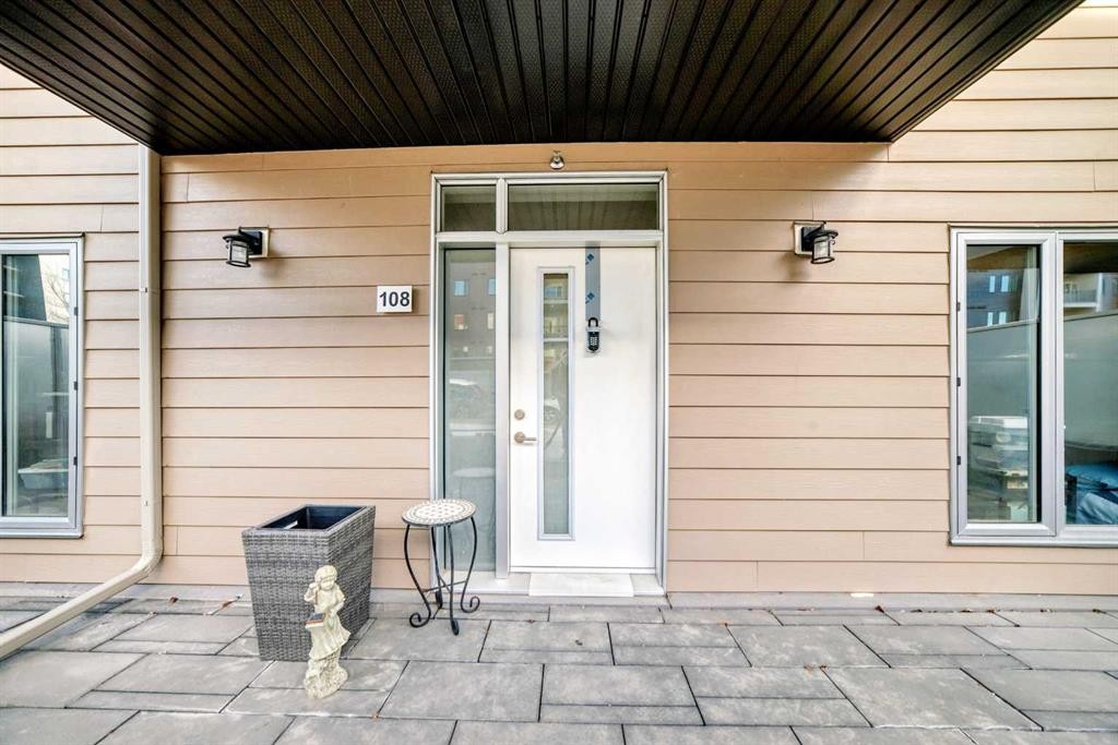 108-71 Shawnee Common Sw, Calgary, AB - Outdoor With Deck Patio Veranda With Exterior