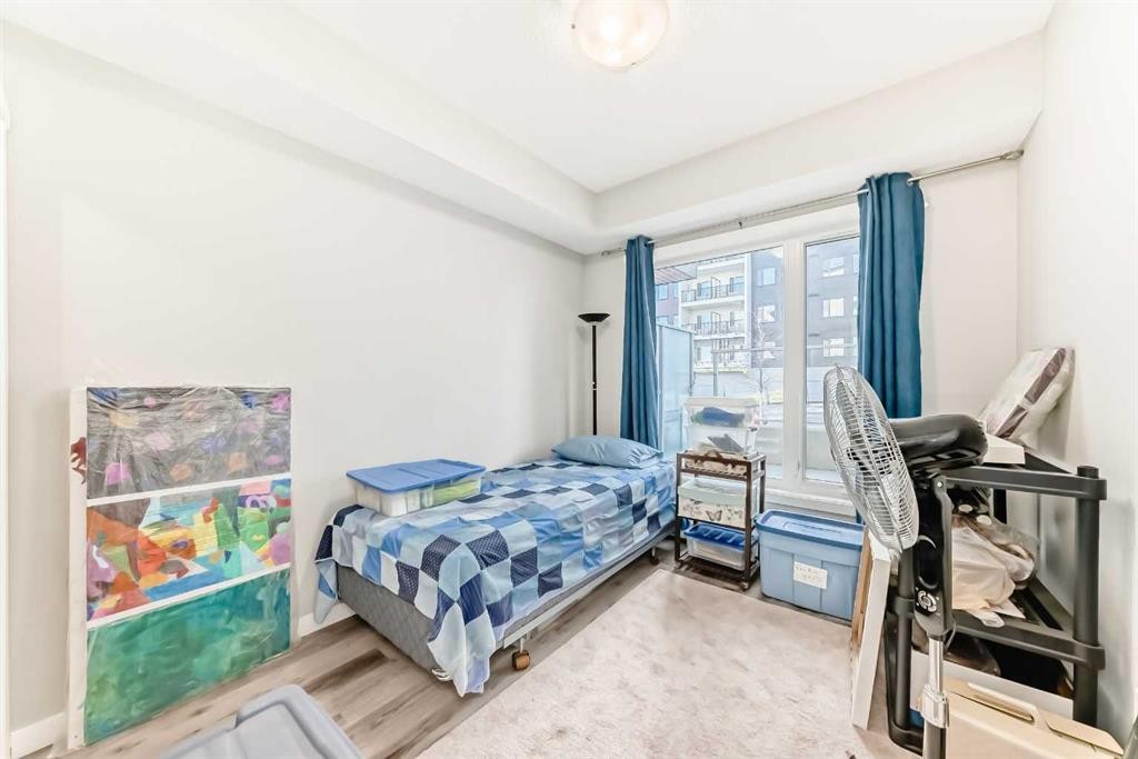 108-71 Shawnee Common Sw, Calgary, AB - Indoor Photo Showing Bedroom