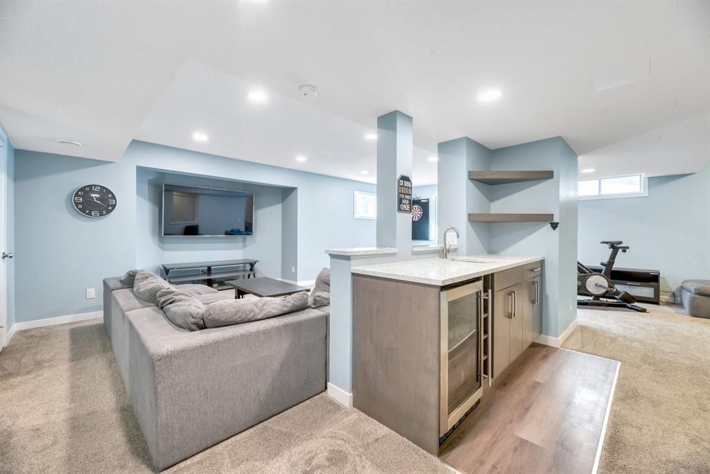 323 Hawkwood Boulevard Nw, Calgary, AB - Indoor With Fireplace