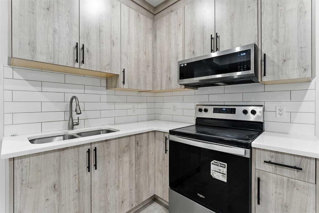 3644 Cornerstone Boulevard Ne, Calgary, AB - Indoor Photo Showing Kitchen With Double Sink With Upgraded Kitchen