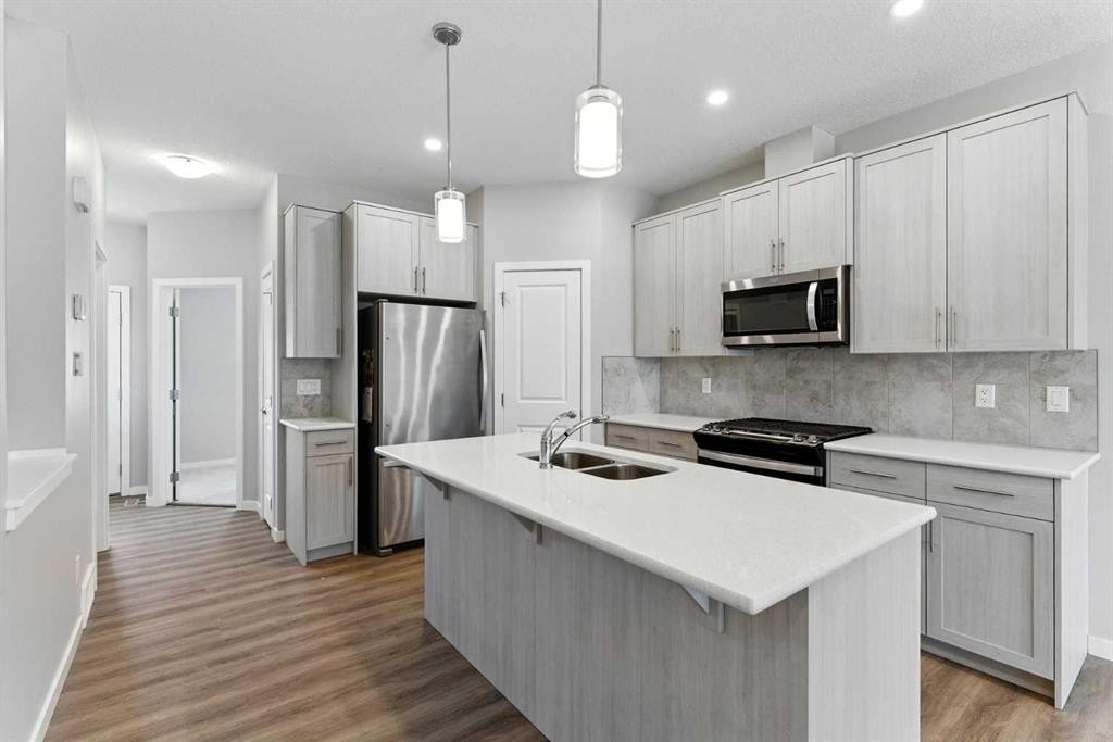 3644 Cornerstone Boulevard Ne, Calgary, AB - Indoor Photo Showing Kitchen With Stainless Steel Kitchen With Double Sink With Upgraded Kitchen