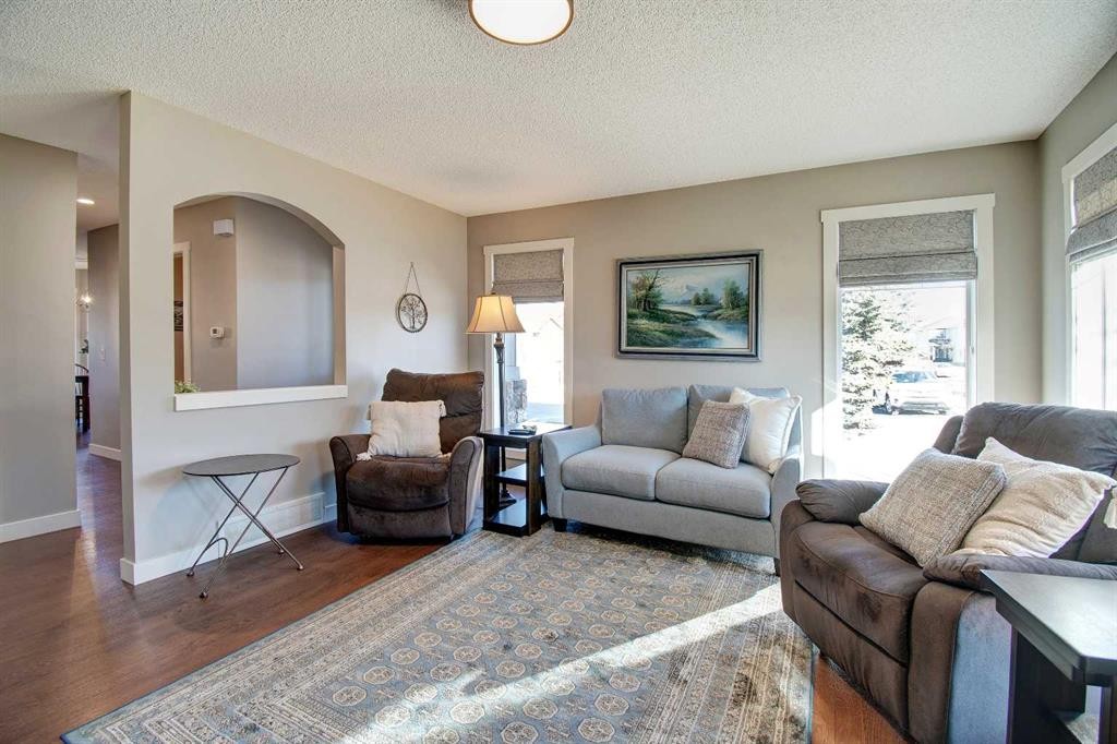 1606-2445 Kingsland Road Se, Airdrie, AB - Indoor Photo Showing Living Room
